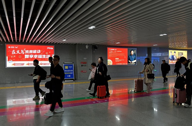 義烏火車站出站通道燈箱廣告投放，義烏站高鐵廣告價(jià)格